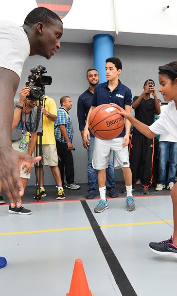 Magic help refurbish basketball court, host youth camp in Brazil